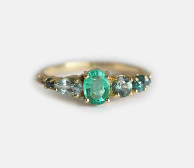 Ovaler Smaragd-Cluster-Ring mit weißen, blauen Diamanten, Saphir- und Aquamarinsteinen