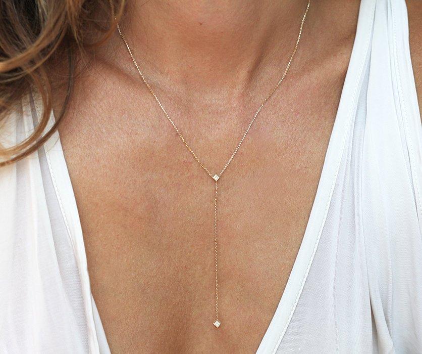 Goldene Lariat-Halskette mit weißem Diamant im Prinzessschliff