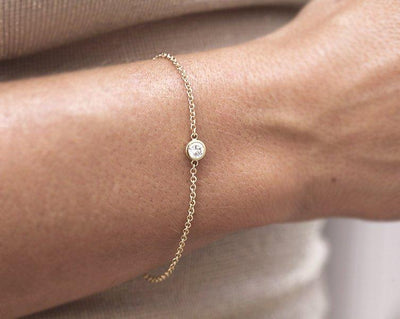 Goldkettenarmband mit rundem weißen Diamanten