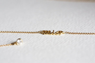 Gold-Lariat-Halskette mit runden weißen Diamanten