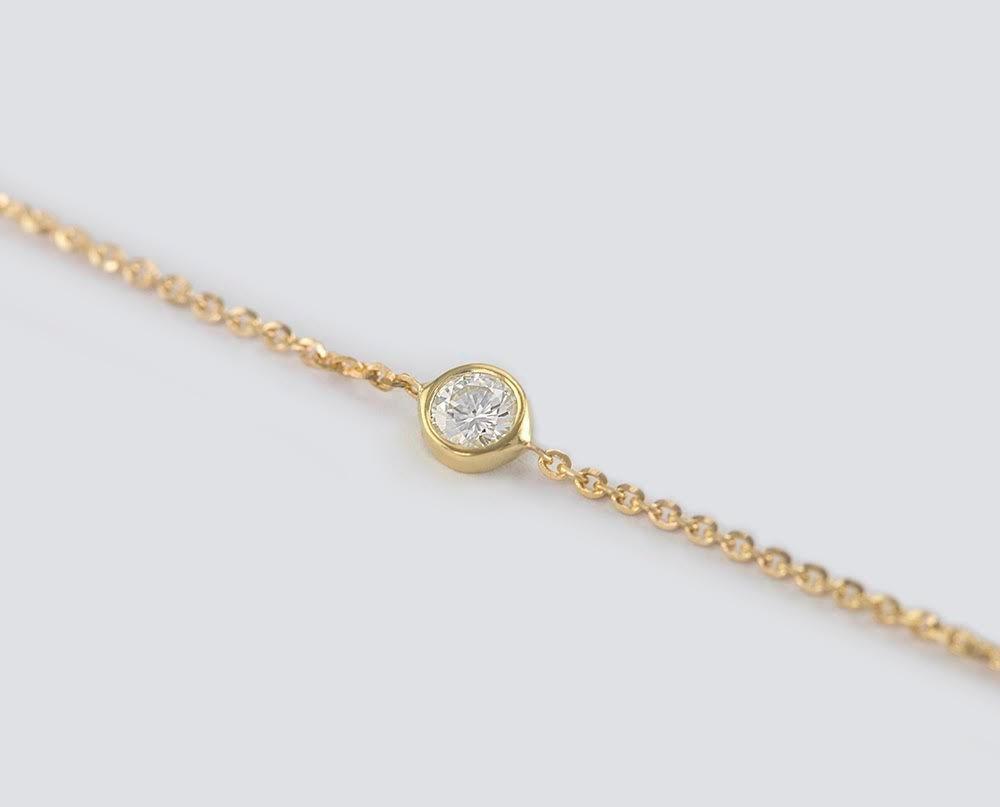 Goldkettenarmband mit Lünette und rundem weißen Diamanten