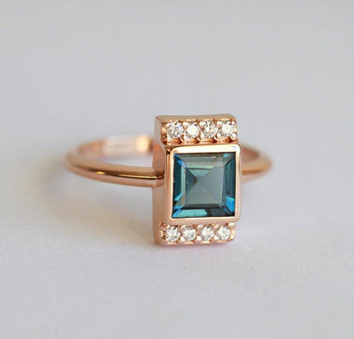 Eden London Blauer Topas-Verlobungsring mit Pavé-Diamanten – Capucinne