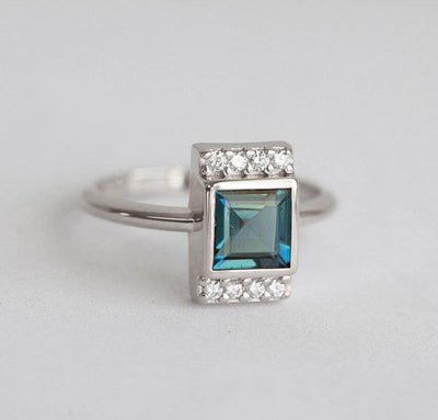 Eden London Blauer Topas-Verlobungsring mit Pavé-Diamanten – Capucinne