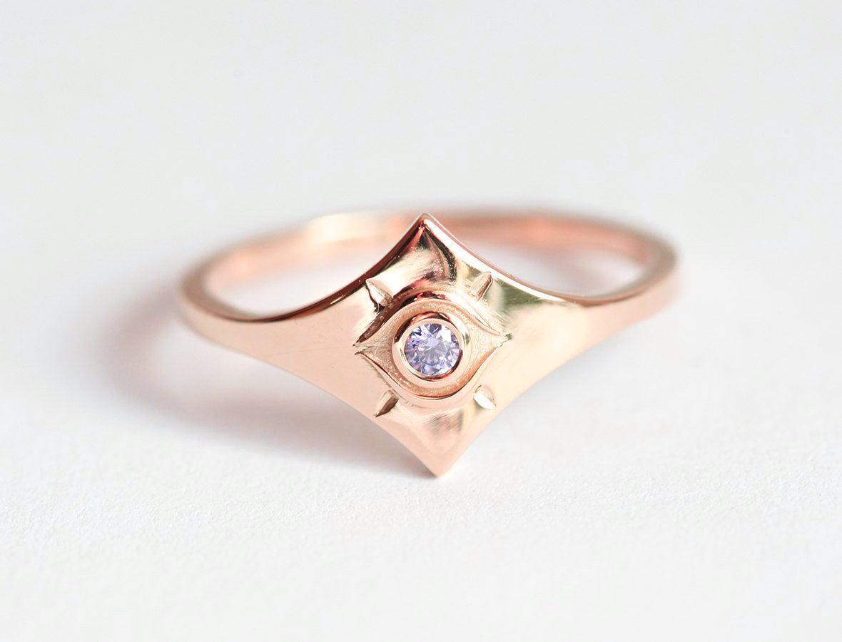 Lila runder Tansanit-Evil-Eye-Ring aus Roségold