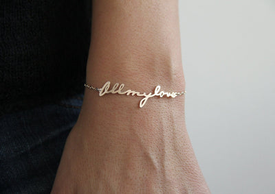 Goldkettenarmband mit personalisierter Signatur