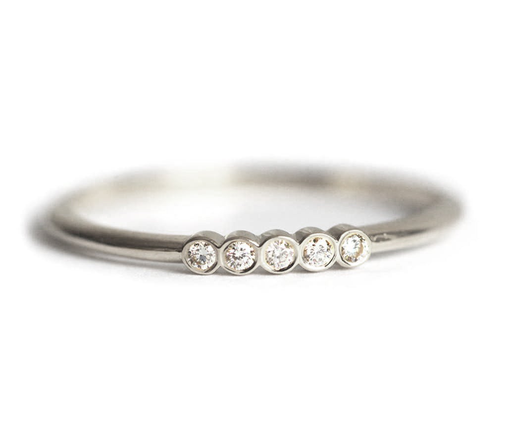 Halb-Eternity-Ring, Fünf-Ring-Capucinne