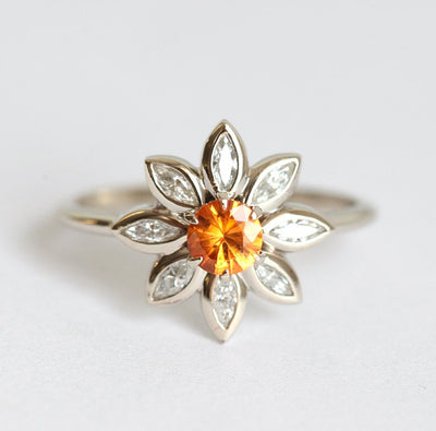 Orangefarbener runder Saphirring mit Diamant-Heiligenschein