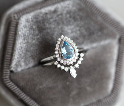 Birnen-Aquamarin-Ring, besetzt mit Diamant-Halo und Marquise-Band